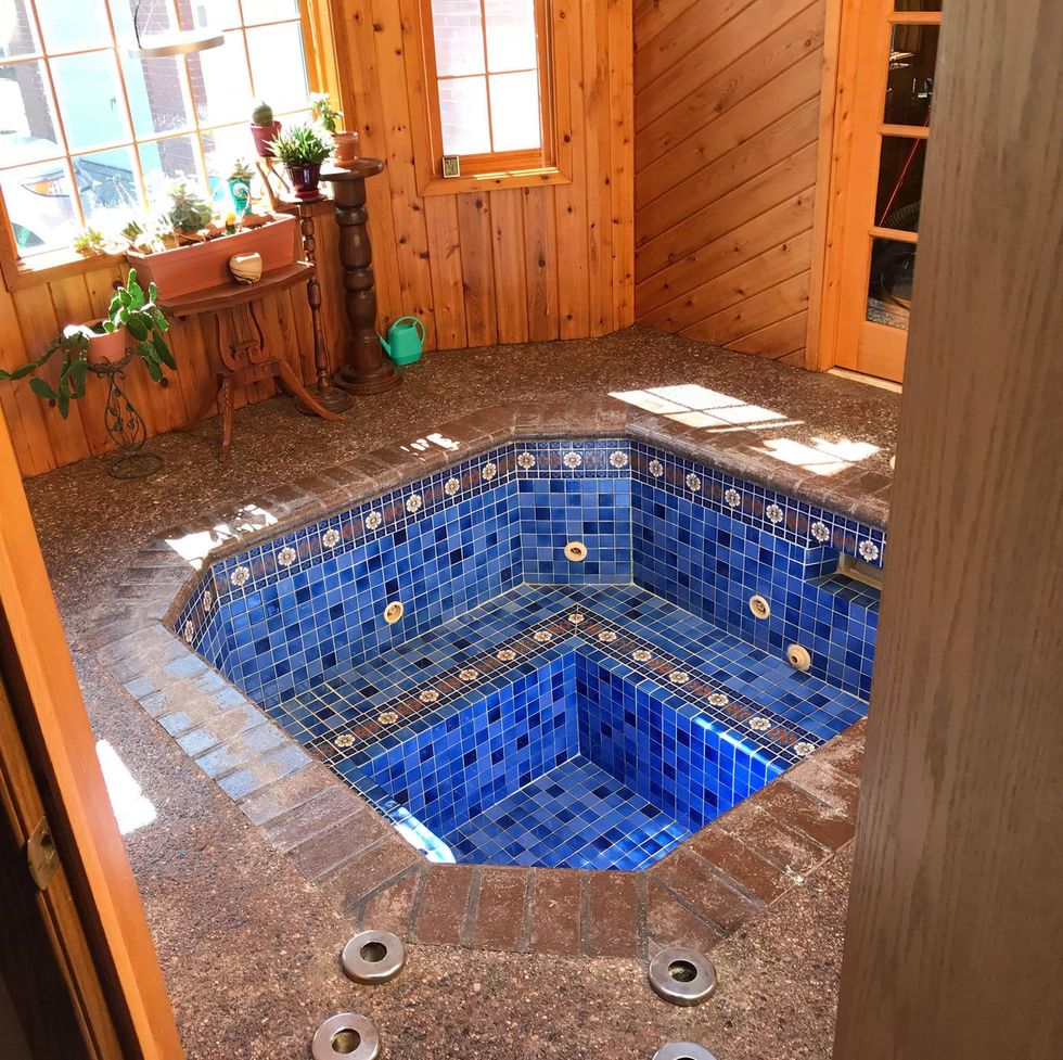 This Couple Unearthed a Hidden Hot Tub in Their Home
